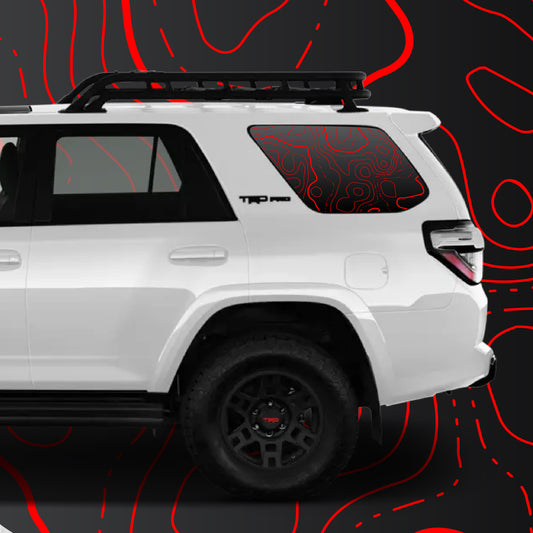 Toyota 4Runner Topographic Window Decal displayed on a white 4Runner, showcasing the topographic design on the rear quarter window.