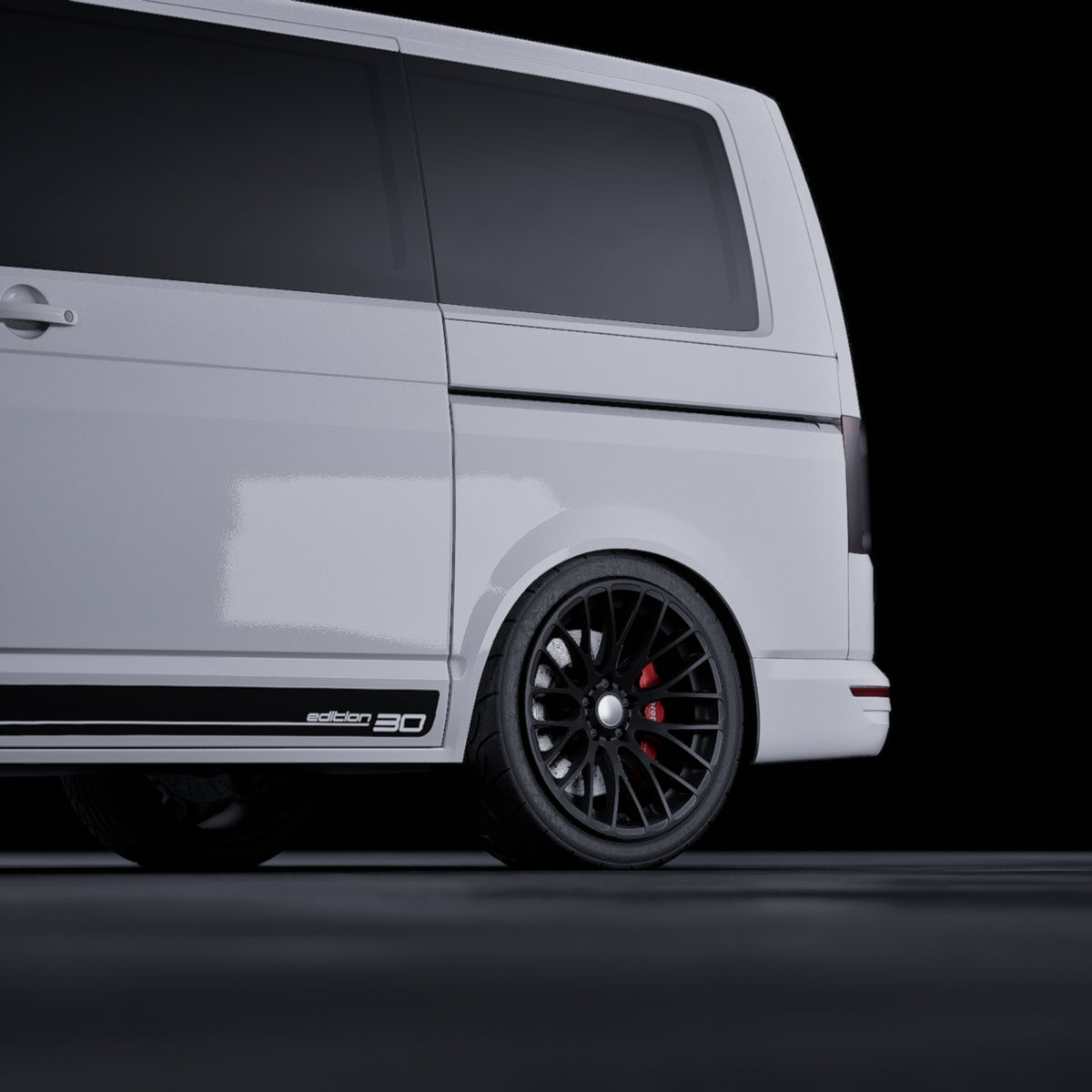 VW Transporter T6 Edition 30 Side Stripe Decal kit showcased on a white van with black wheels and stylish side stripes.