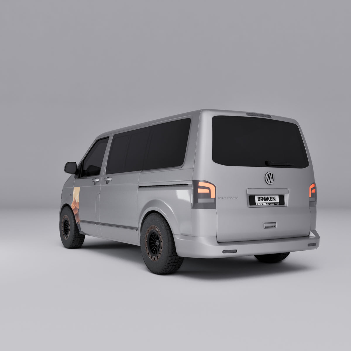 VW Transporter T5 T6 Sunset Mountain Forest Door Decal on a silver van exterior