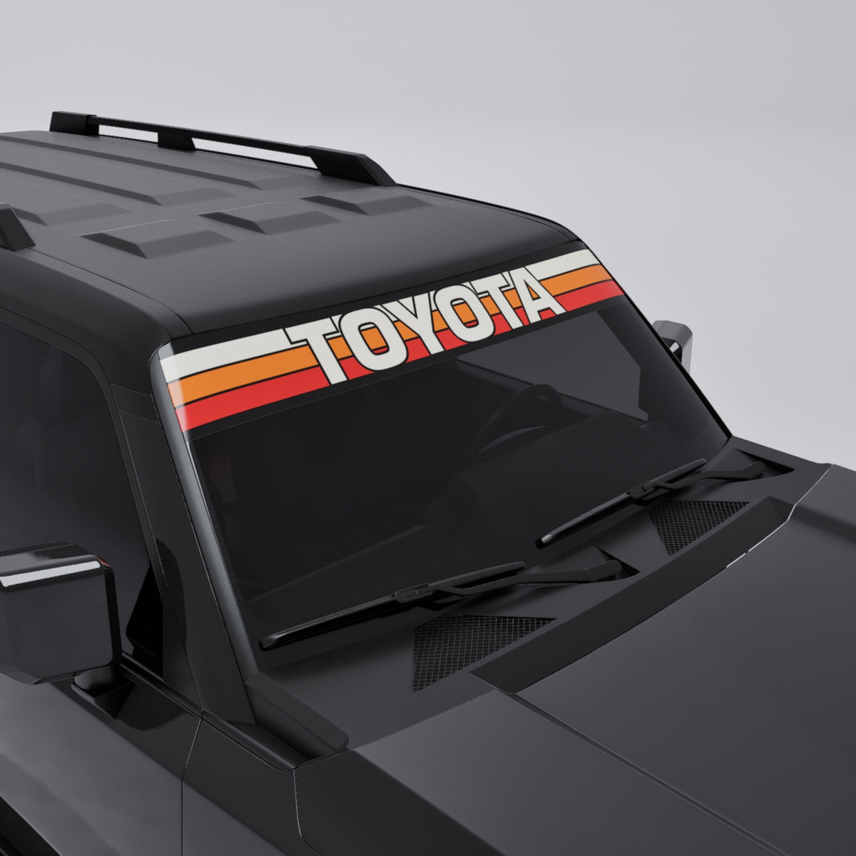 Toyota Retro Stripe Windshield Banner Decal on a black vehicle, showcasing 70s vintage design with bold colors.
