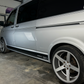 VW Transporter T6 Edition 30 Side Stripe Decal on silver van with stylish wheels in garage.