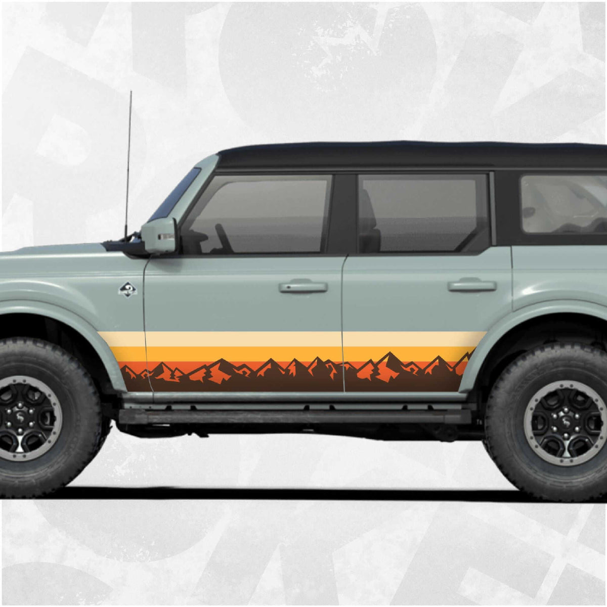Ford Bronco Vintage Stripe Decal showcased on a classic Ford Bronco with sunset colors and mountain silhouettes.