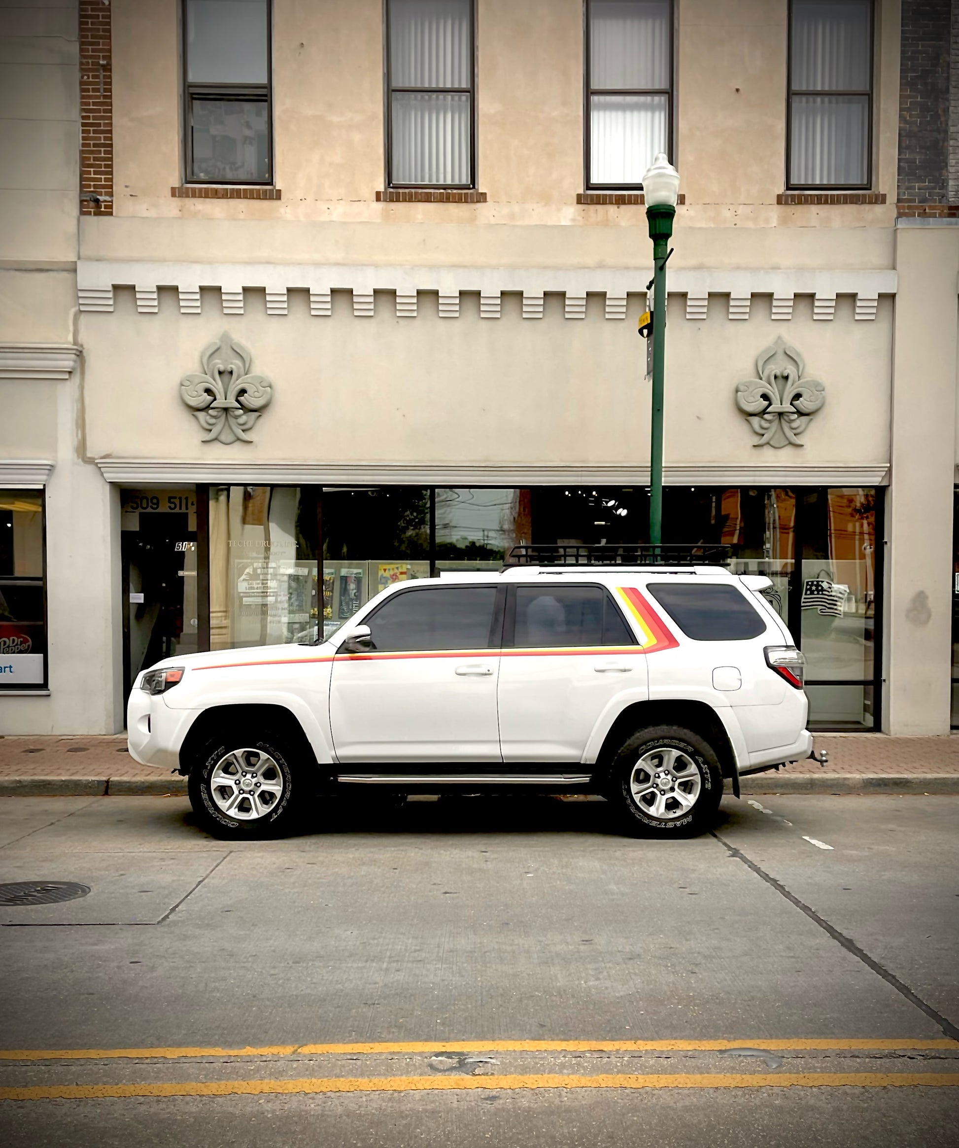 Toyota 4runner in urban environment with side stripe decals